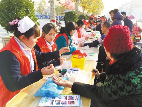 [鄲城]“紅馬甲”為國際志愿者日添彩